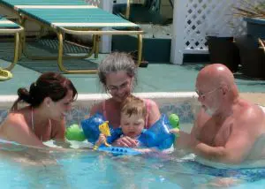 family in pool